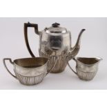 Three piece silver tea set. Hallmarked Sheffield 1883 by Jehoiada Alsop Rhodes & Barber. Total