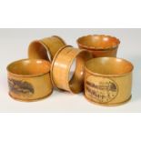 Mauchline ware; Lowestoft, Bath, Lyme, Whitby, all napkin rings in boxwood.