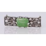 Silver Brooch set with central Jade stone surrounded by Diamonds weight 6.0g