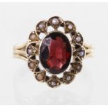 Yellow metal (tests 15ct) Garnet and Seed Pearl Ring size K weight 3.6g