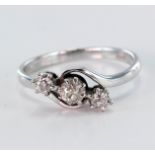 White metal stamped 18ct three stone Diamond Ring size O weight 3.3g