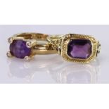 Two 14k stamped Amethyst set Rings weight 9.4g