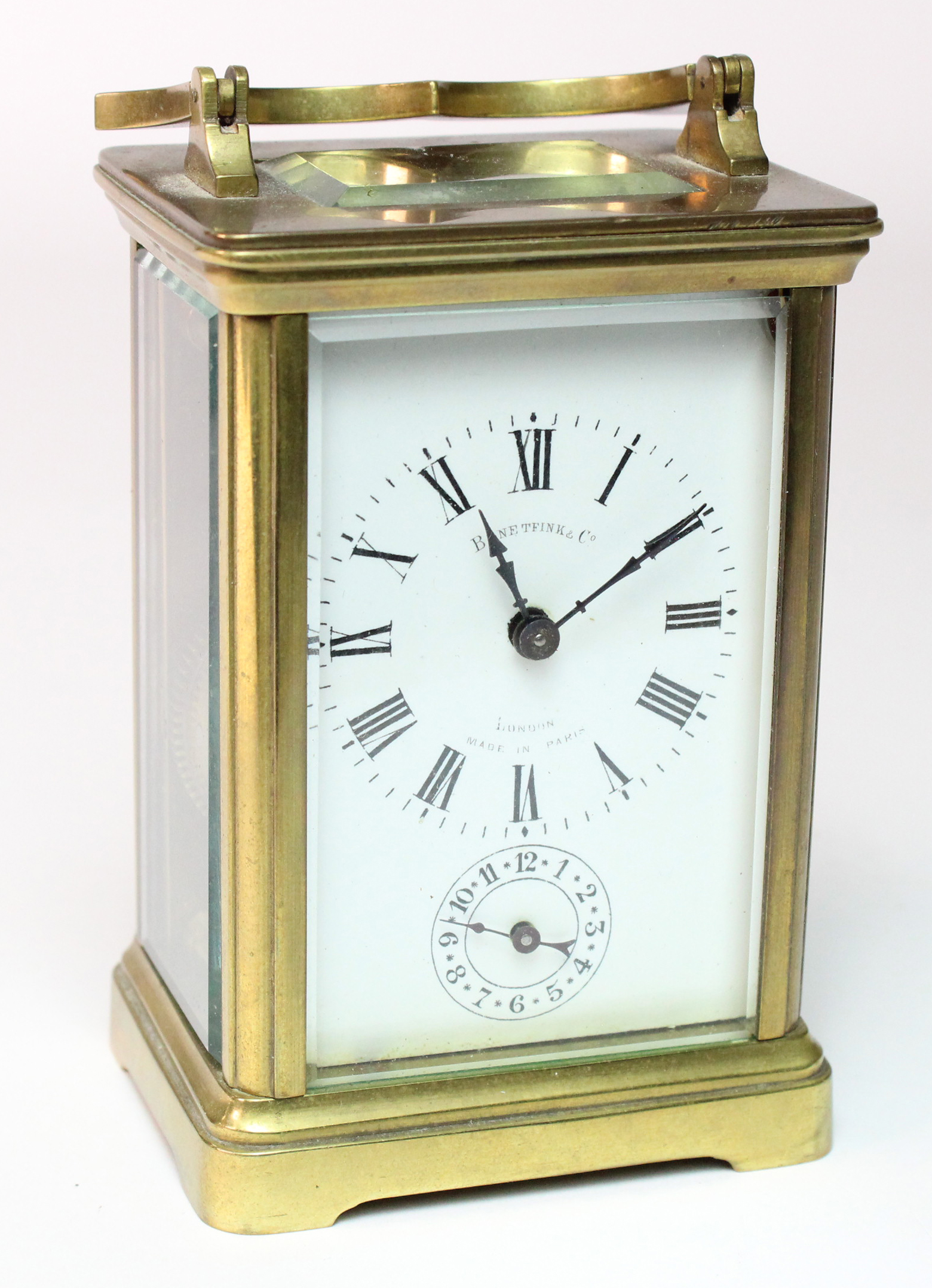 Brass five glass carriage clock, white enamel dial with Roman numerals, dial reads 'Benetfink & Co.,