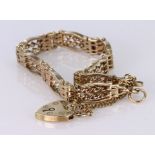 9ct Gold Gate style Bracelet with Padlock and safety chain weight 21.8g