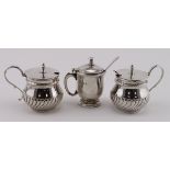 Mixed lot of silver mustard pots comprising two matching pots with blue glass liners,s hallmarked
