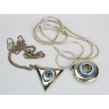 Masonic interest. Two Masonic 'All Seeing Eye' pendants on chains, one stamped '925', diameter