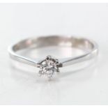 White Gold Ring stamped 585. Six claw setting Solitaire Diamond approx 0.20 ct wt. Size M weight 1.