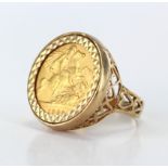 Half Sovereign dated 1903 in a ring mount (size Q). Total weight 8.8g
