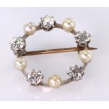 Brooch (tests Platinum and Gold) set with five Diamonds and Pearls approx 1ct of Diamonds weight 3.