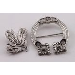 Scottish Provincial brooches (2) - Shetland silver, one marked SS, Silver, the larger brooch is
