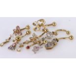 Trade lot of as new 9ct Gold stone set Belly bars weight 14.2g (8)