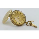 Mid-size 18ct cased (36mm) open face pocket watch with a 9ct brooch attached, working when