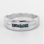 9ct hallmarked White Gold Ring set with blue CZ stones size T weight 5.5g