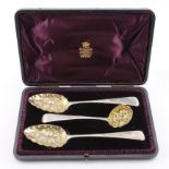 Boxed set of two George III Hallmarked silver Berry spoons & silver sifter. All Hallmarked London