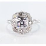 White metal Ring stamped 18ct set with CZ surrounded by white Sapphires size P weight 3.2g