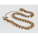 9ct Gold Curb Bracelet with safety chain weight 22.6g