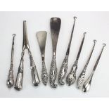 Mixed lot of silver and steel button hooks (5), shoehorns (2) and glove stretchers (1) - (eight