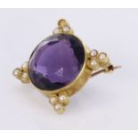 Yellow metal (tests 14ct) Brooch set with Amethyst and Seed Pearls weight 7.7g