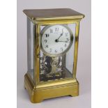 Eureka Clock Co. Ltd brass four glass mantel clock, Arabic numerals to dial, engraved with nos. 'no.