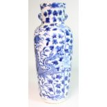 Chinese blue & white vase, with Chinese characters to base, decorated with two dragons, height