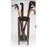 Walking sticks. A collection of ten various walking sticks, a couple with silver mounts (sold as