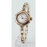 Ladies 9ct cased wristwatch on a yellow metal expandable bracelet