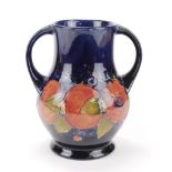 Moorcroft. High quality 1930's 'Pomgranate' twin handle vase. Signed William Moorcroft with '