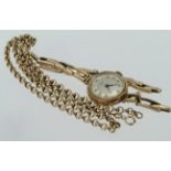 Ladies 9ct cased wristwatch on a 9ct broken bracelet along with a 9ct chain
