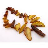 Highly unusual and unique amber fringe necklace consisting of large natural shaped pieces of