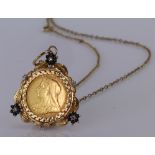 Victorian Sovereign dated 1894 in a 9ct pendant mount on a 9ct chain. Total weight 15.4g