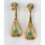 Yellow metal (tests 18ct) Emerald set Drop Earrings weight 2.4g