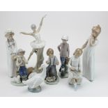 Lladro Nao. A collection of seven Lladro Nao figures, including children, goose, etc., together with