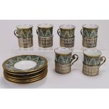 Wedgwood. Set of six Wedgwood gilt decorated china coffee cans and dishes, cans in silver mounts (