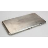 Silver engine-turned cigarette case hallmarked HB&S 1935; weighs 7.5oz.