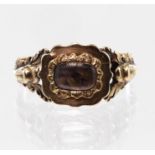 Yellow metal tests 9ct Georgian style Mourning Ring with hair set panel weight 1.7g size L