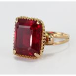 Yellow metal tests as 18ct synthetic Ruby Ring size M weight 6.8g