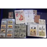 Trade cards, 2 albums containing an interesting selection of foreign and English trade cards, mostly