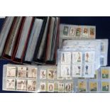 Trade cards, a large quantity of trade cards in albums (6) & sleeves, many different issuers &