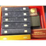 Coin accessories, a large quantity of coin cases many still with empty coin capsules inside for
