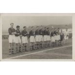 Football Postcard, b/w photographic card showing team line-up of the British Forces team v Sport