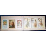 Ephemera, an album of 100+ Communion cards, mainly Paris 1890-1900 some lace/silk, mounted in a