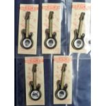 Music memorabilia, The Beatles, set of 5 plastic Beatles Guitar Brooches, all on cards of issue,