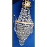 Vintage Lighting, a Victorian 4 tier drop glass chandelier with cherub and swag detailing to