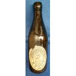 Breweriana, Lambert & Norris, Arundel, brown glass bottle with label attached for Stout, raised