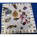 Militaria, assorted militaria to include a Victorian helmet plate (buyer to ascertain if possible