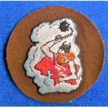 Militaria, embroidered cloth badge mounted on brown felt backing thought to be a U.S. flying