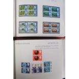 Stamps, Large collection of GB stamps in 4 albums, 1 UM QEII mainly in blocks of 4, the others