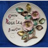 Tobacco advertising, a Faience ware plate, 'Chew Rose Leaf Fine Cut', decorated with raised flowers,