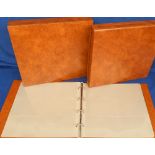 Postcard accessories, three tan coloured postcard albums each with matching slip case and all with a