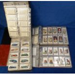 Cigarette cards, three modern albums, one Player's, one Wills & the other Churchman's, each